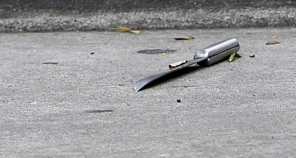 epa05765784 A knife lies on the ground at a shopping centre adjacent to Bonnyrigg high school, west of Sydney, Australia, 02 February 2017. Acording to media reports, a teacher and two students were injured with stab wounds allegedly by another student at a high school in Sydney. EPA/DAN HIMBRECHTS AUSTRALIA AND NEW ZEALAND OUT
