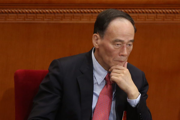 Yolsuzlukla Mücadele Bürosu Şefi Wang Qishan 5 Mart 2014 tarihinde Pekin'de Büyük Halk Salonu'nda. 