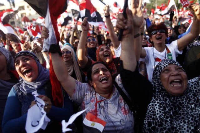 03 Temmuz 2013 Mısır'da Ordu tarafından darbe gerçekleştikten sonra halkın sevinç çığlıkları (MAHMOUD KHALED/AFP/Getty Images)